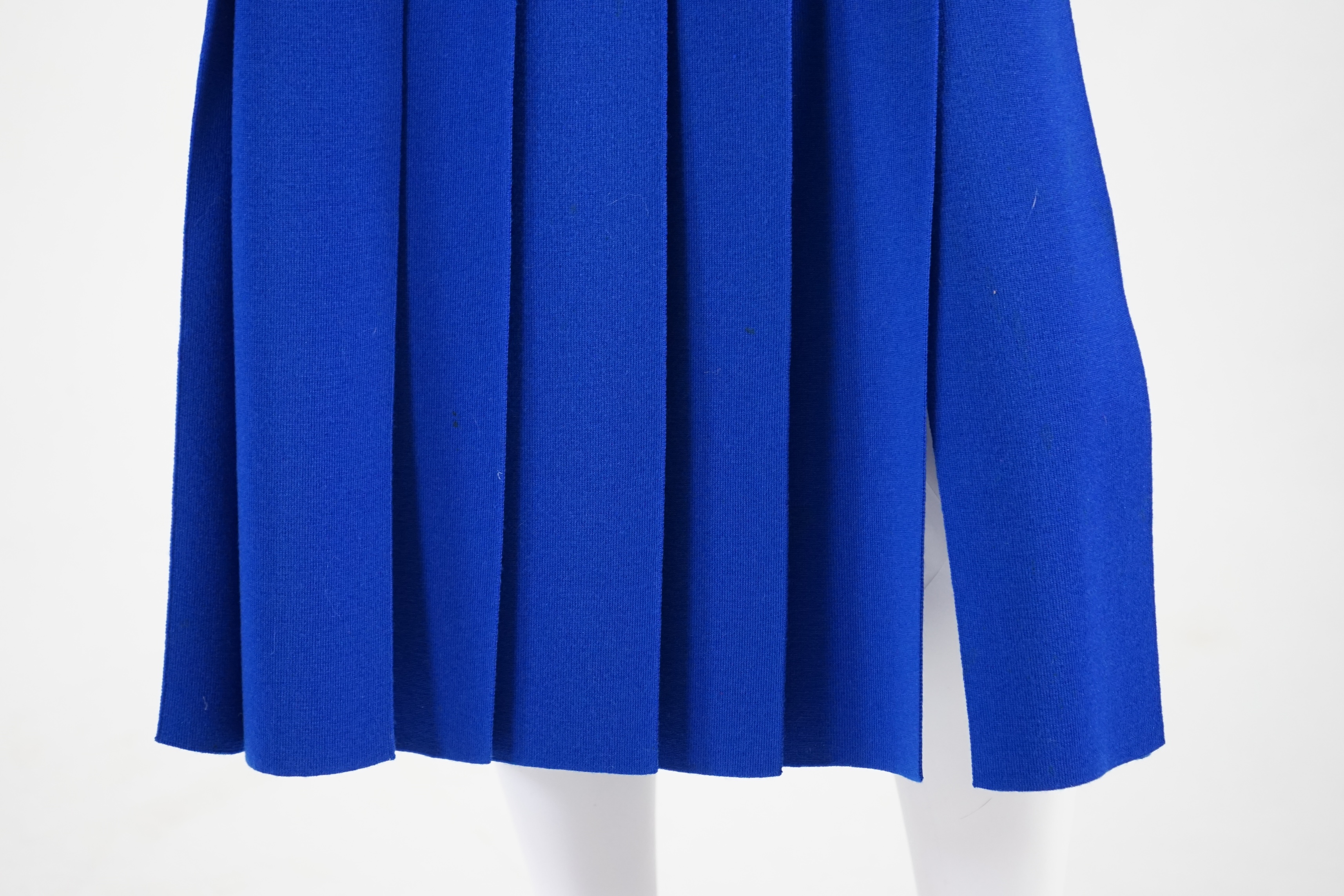 Two Escada knitted skirts. Proceeds to Happy Paws Puppy Rescue